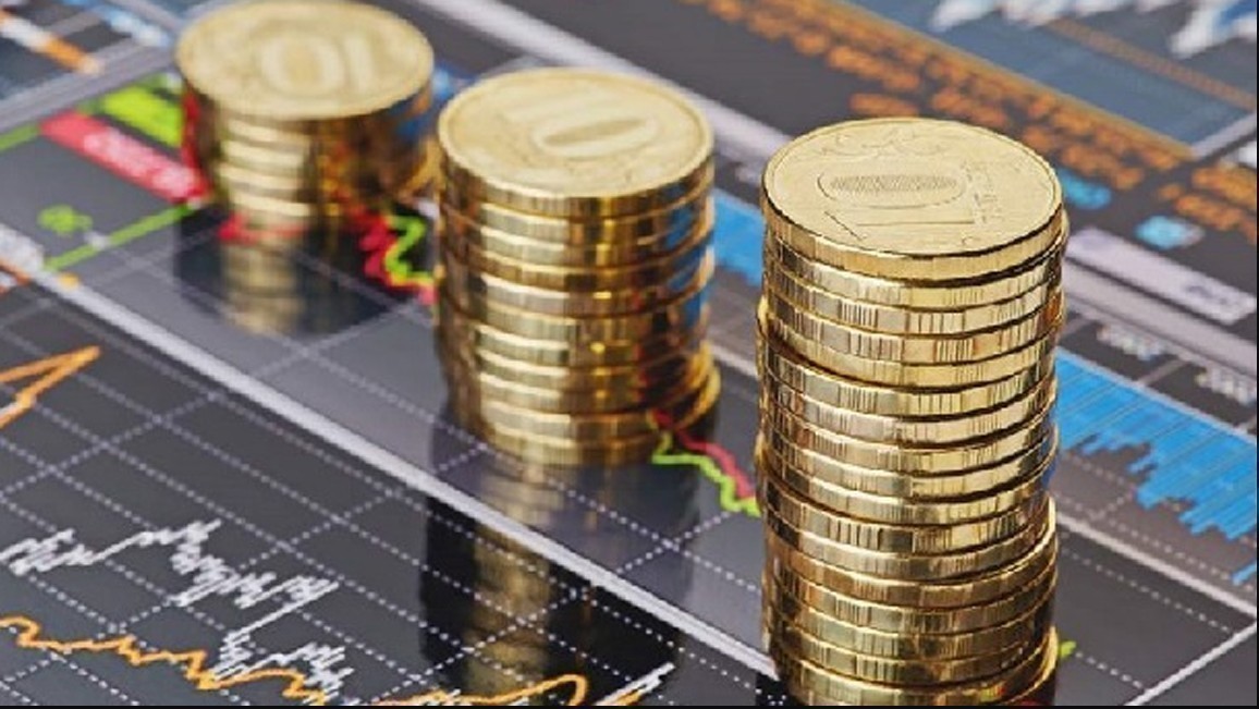 Monedas sobre gráficos